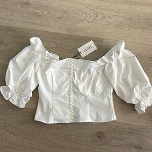 White blouse size medium, Leche brand, ruffle sleeves